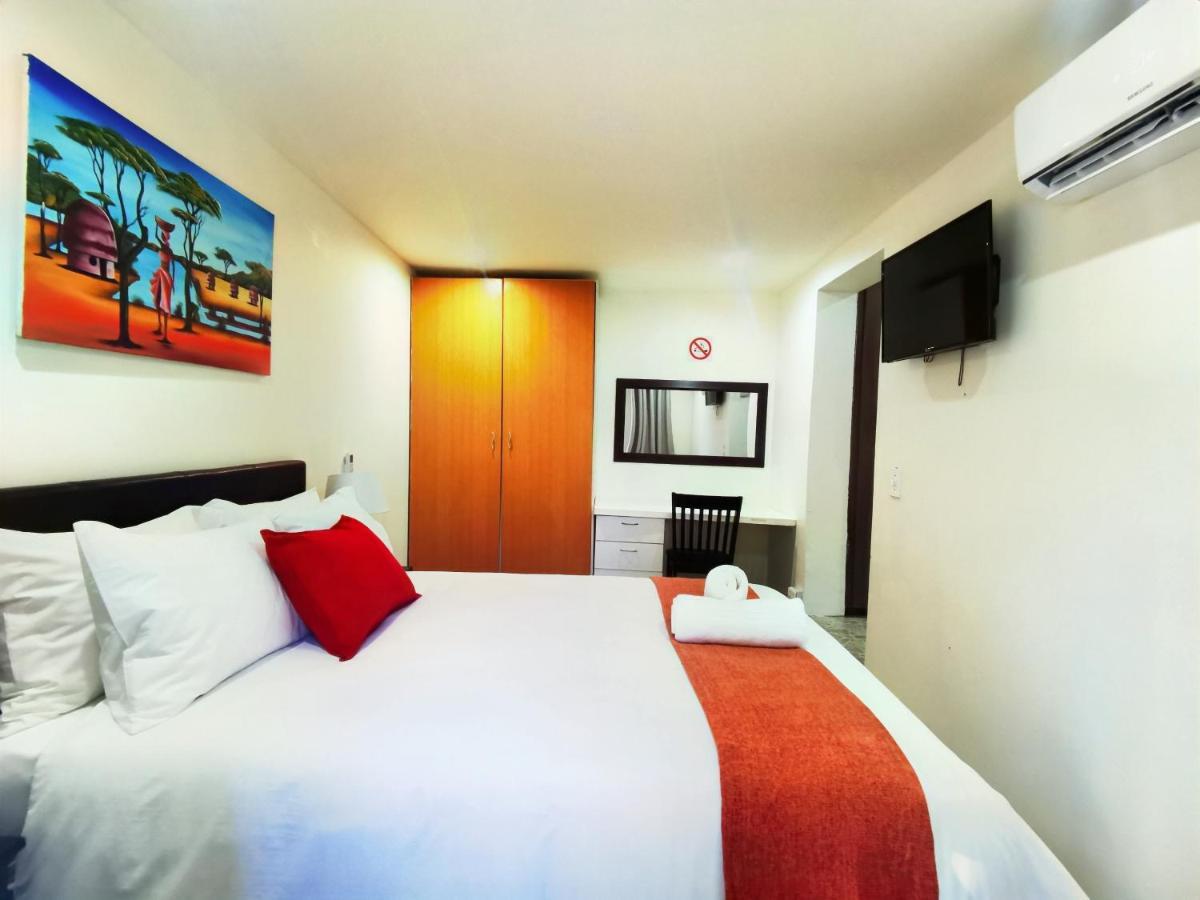 Libra Lodge Sandton Szoba fotó